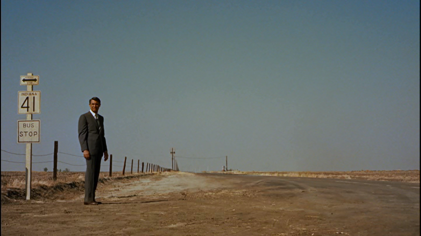 Cary Grant on the side of the road in North by Northwest