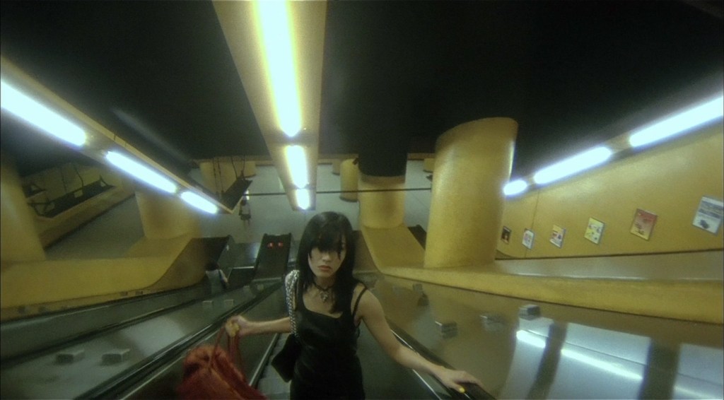 A girl riding an escalator in Fallen Angels