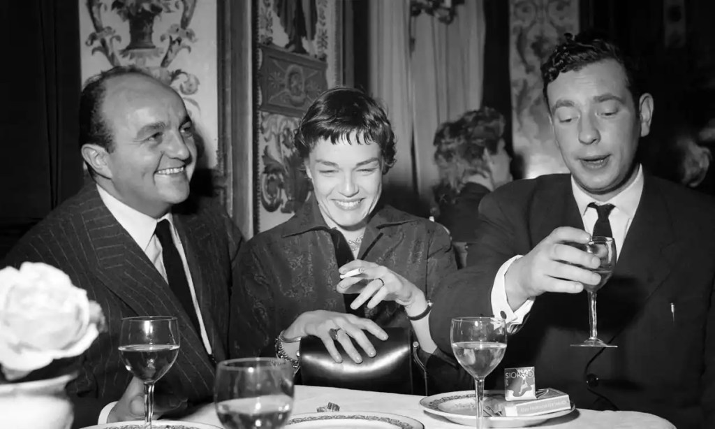 Alexandre Astruc and Simone Signoret at dinner