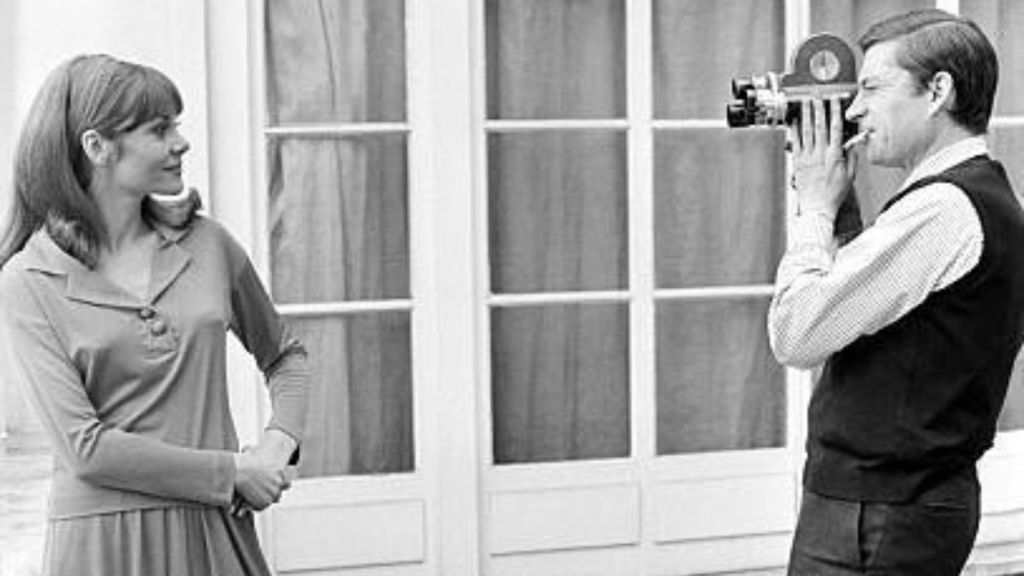 Photo of Jacques Doniol-Valcroze filming his wife Francoise Brion